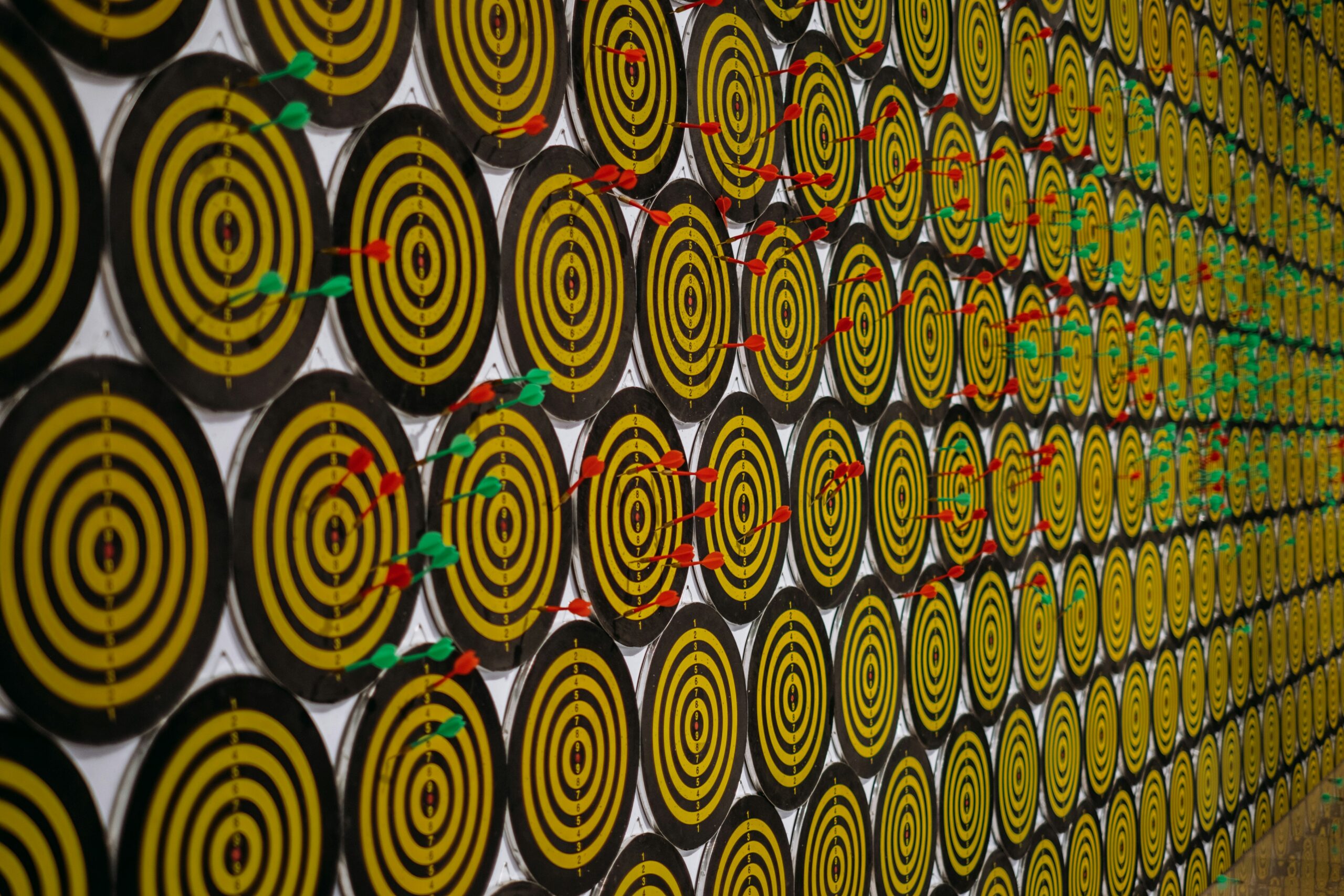 Repeated archery targets with arrows hitting consistent marks, symbolizing disciplined investment strategy and consistency.
